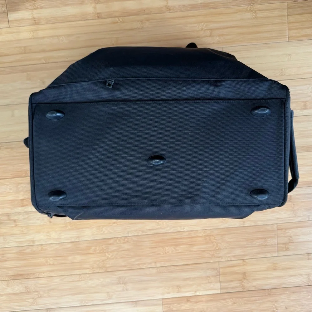 Tumi Black Duffel Bag with Adjustable Shoulder Strap